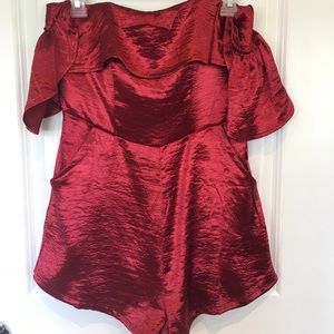 Red satin off the shoulder romper with pockets